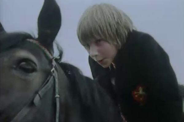William... he's kind of a git in many ways, really. Here he is riding a horse... why would take too long to explain, but it's very contrived