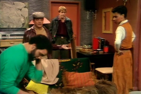 Denzil and Corrine... Denzil's okay, but does drink Red Stripe, talk about Viv Richards and greets people with a hand slap... it's not exactly a nuanced depiction of a black guy